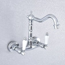 Polished Chrome Wall Mounted Swivel Bath Mixer Tap Basin Faucet Two Handle
