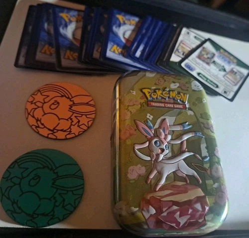 Pokemon Sylveon Prismatic Evolutions Mini Tin