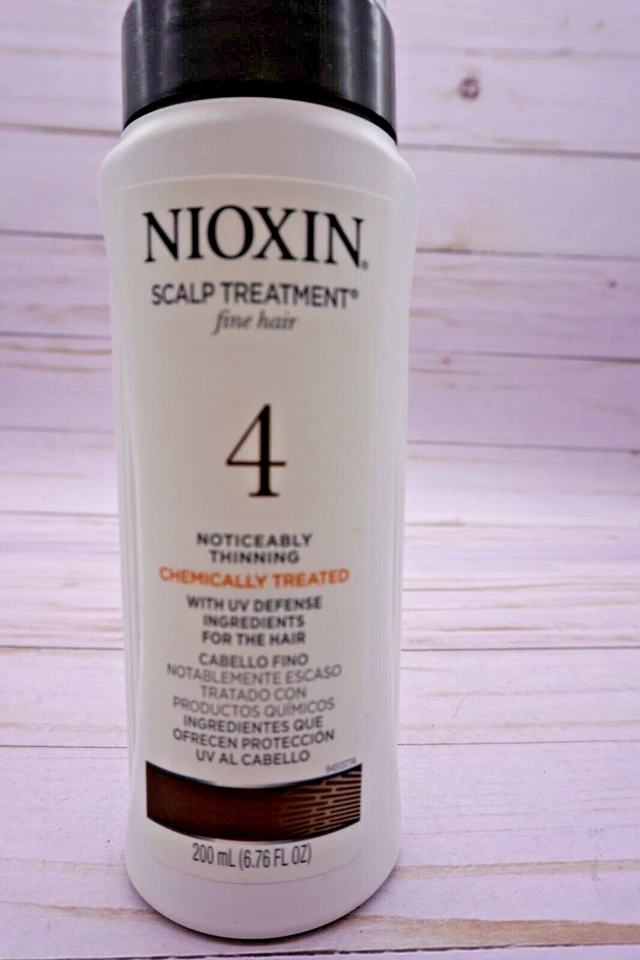 Tratamiento para cuero cabelludo Nioxin 4 cabello fino fino mejorado químicamente 6,76 oz con defensa UV Foto 2 de 2