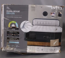 Intex Dura-Beam Deluxe Queen Air Mattress with Built-In Pump and Headboard..
