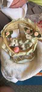 Porcelain Sleeping Cat Figurine in Basket with Pink Yarn Ball and Roses