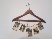 Vintage wooden hanger for a coat and hooks for pants