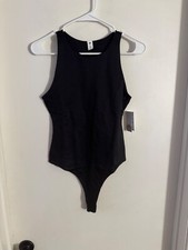 Women "BP" black sleeveless ribbed 1 piece bodysuit. Size Small Reg. 29.50
