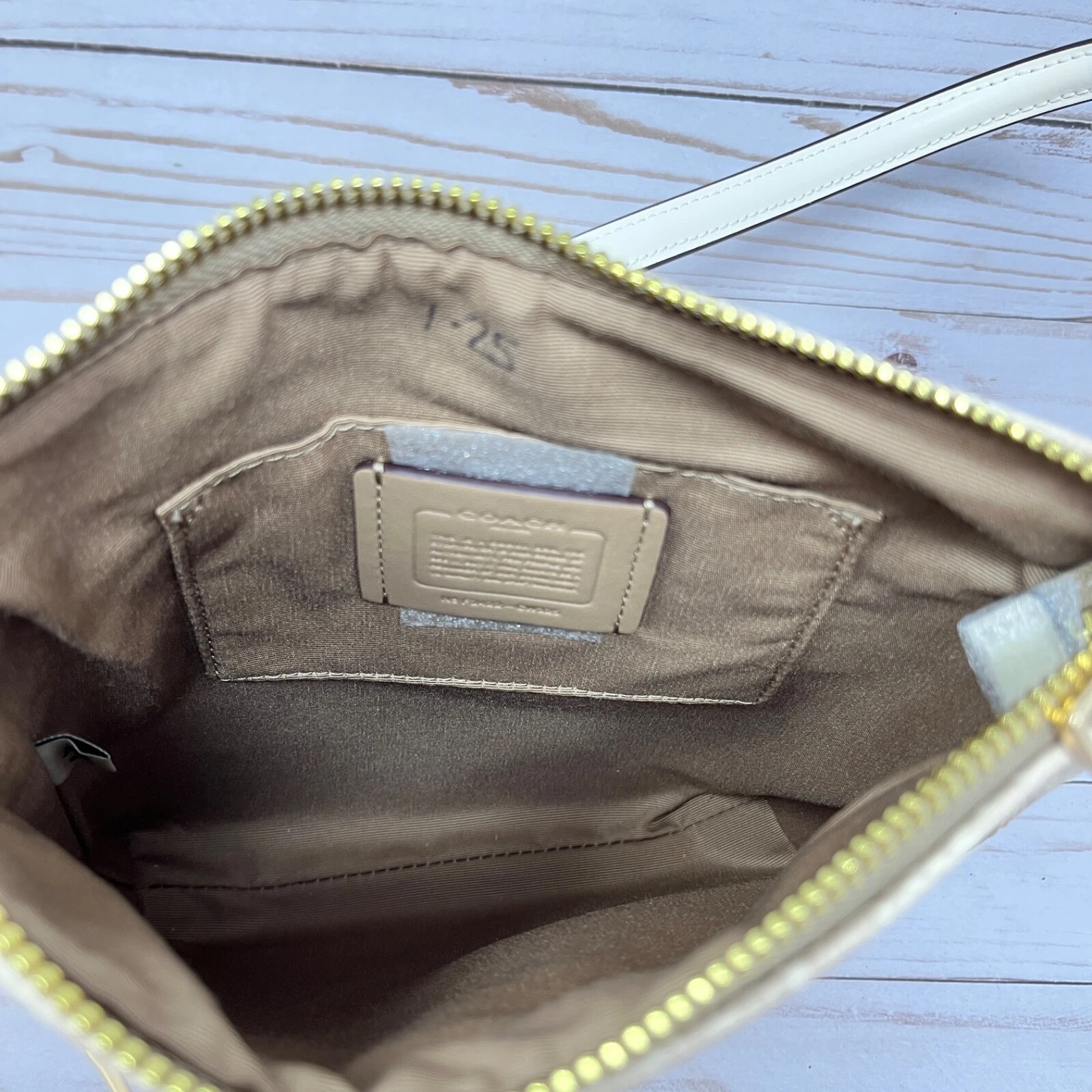 Borsa a tracolla Coach Mini Rowan File Marrone Gesso Nuova con difetto estetico