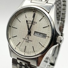 New battery included. CITIZEN QUARTZ men's watch, silver, day-date.