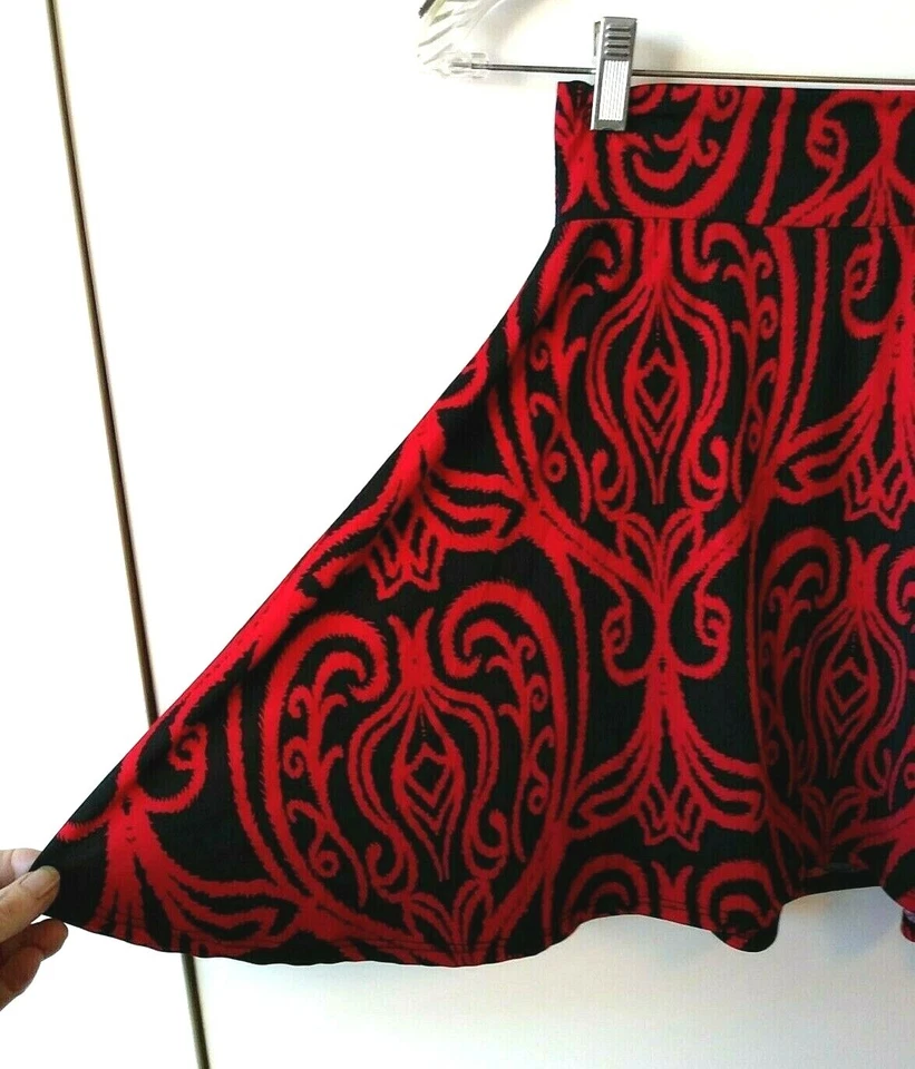 НОВАЯ ДЕВОЧКА LULAROE KIDS ЛАЗУРНЫЙ ЧЕРНЫЙ С КРАСНЫМ ПРИНТОМ ЭЛАСТИЧНЫЙ КАЧЕЛИ ЮБКА РАЗМЕР 8 - Изображение 2 из 3