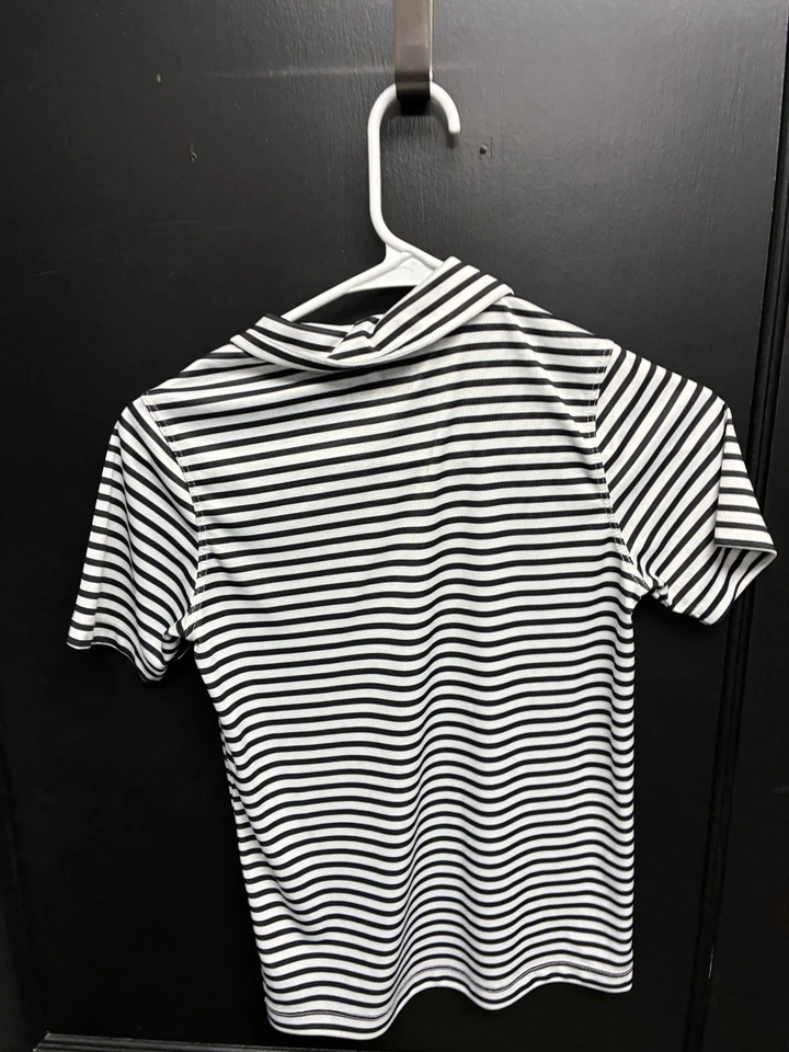 Camisa polo New Balance manga corta a rayas negras/blancas para niños - talla 10 Foto 2 de 3
