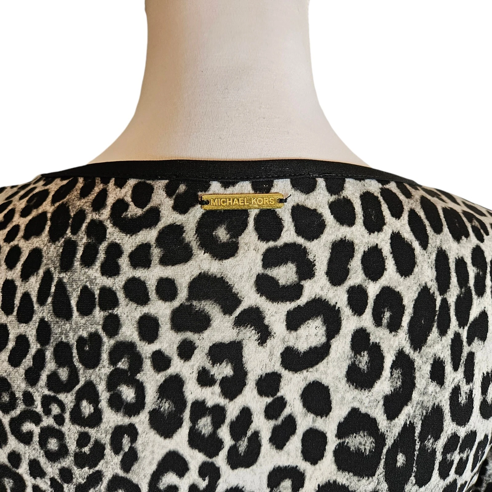 Abito Michael Michael Kors stampa leopardata animalier taglia media manica a campana orlo con volant