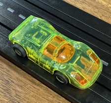 TYCO HP-7 CHASSIS PORSCHE 908 TRANSLUCENT LIME GREEN. RUNS STRONG. GREAT COND.