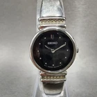 Seiko Watch Women 21mm Black Dial Silver Tone Round 1N00-0SC0 New Battery