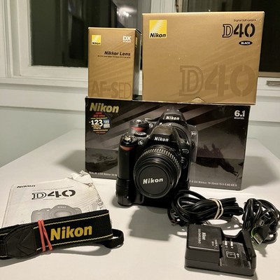 Nikon D D40 6.1MP Digital SLR Camera Kit w/ AF-S DX 18-55mm Lens & Battery Grip.