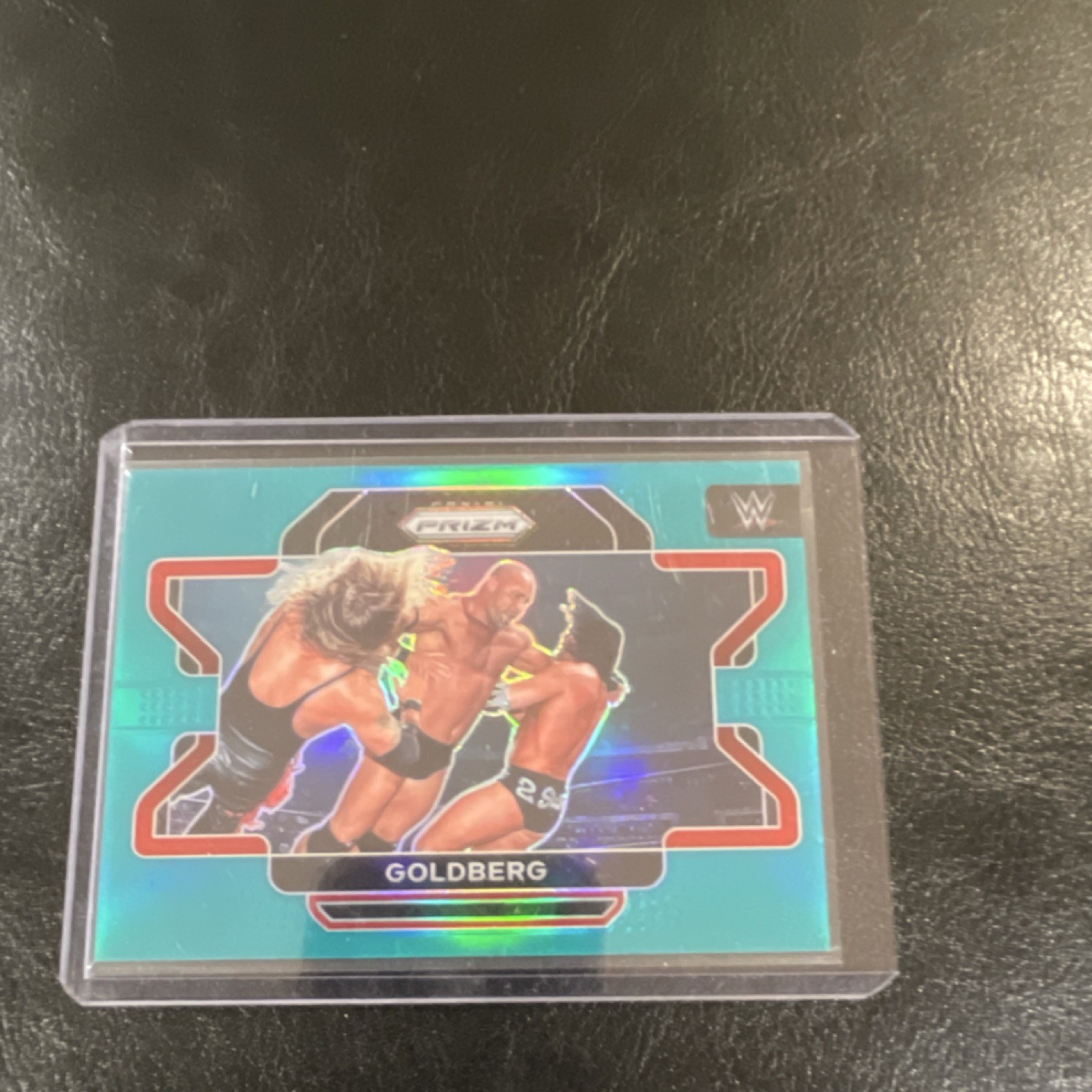 2022 Panini Prizm WWE Goldberg #33 Teal Prizm /49 Wrestling
