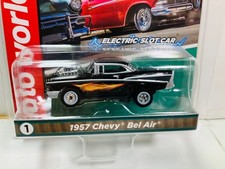 AUTO-WORLD THUNDERJETS carded 1957 CHEVY BEL AIR in BLACK  for Aurora AFX