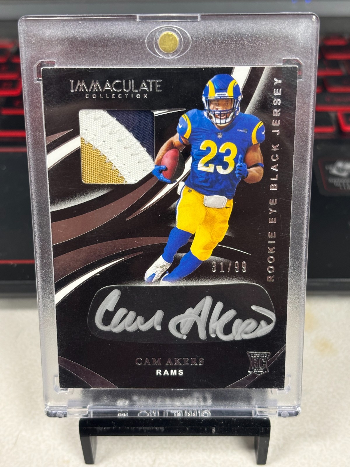 CAM AKERS 2020 PANINI IMMACULATE COLL ROOKIE EYE BLACK PATCH RC AUTO 31/99