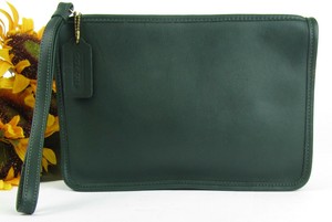 green leather clutch