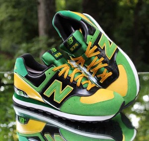new balance 574 black yellow