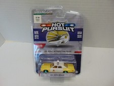 1/64 GREENLIGHT HOT PURSUIT 1974 DODGE MONACO LAS VEGAS POLICE CAR YELLOW CHASE