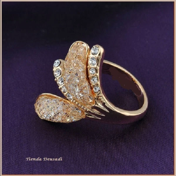 Gold ring with white stone deals design