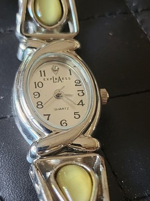 LA Express Ladies Silver Tone Expansion Watch Oval Shape Face W/ Green Cabachons
