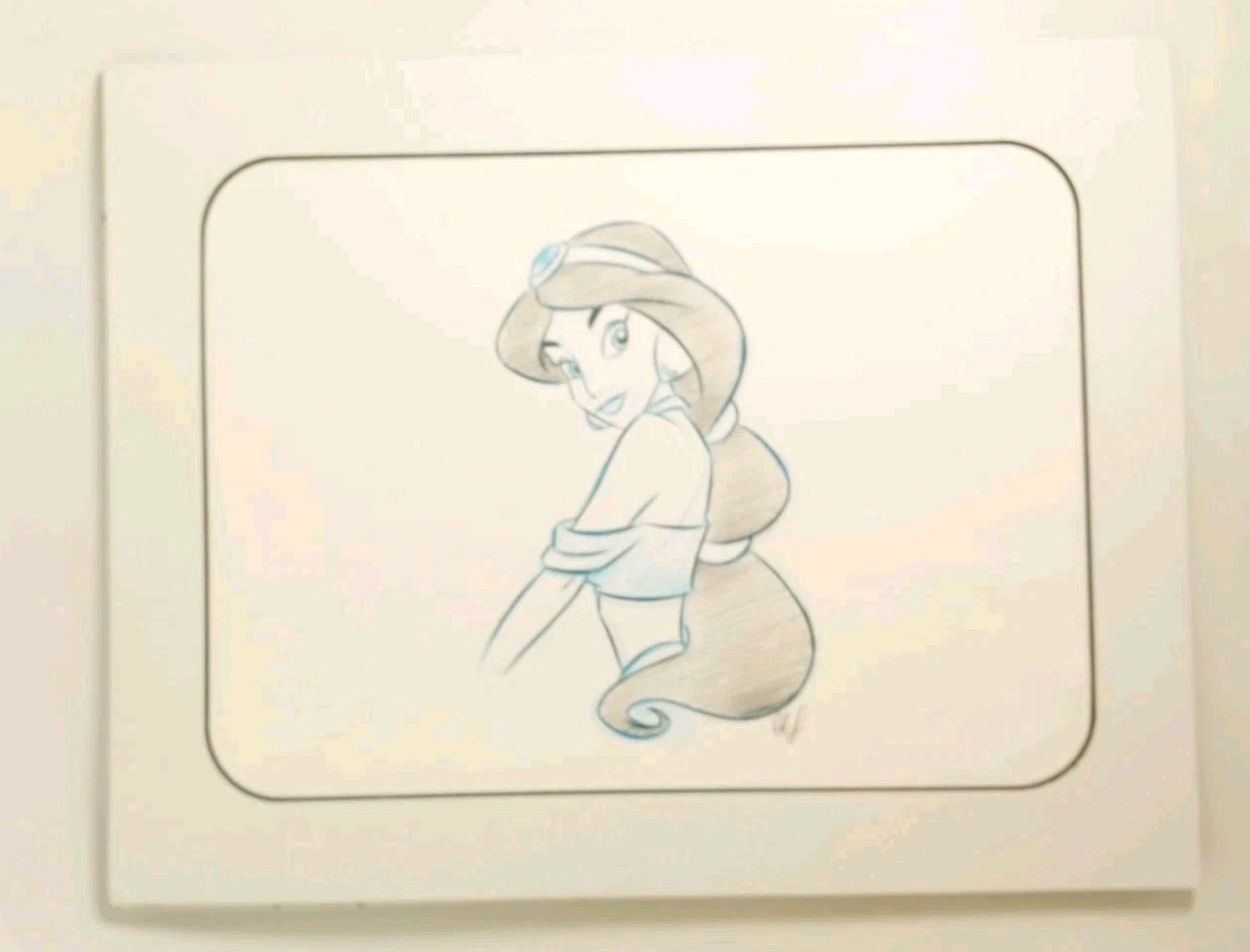 Dibujo de personaje original de Disney de Jazmín firmado por Aladdin con sello y alfombrilla de parques