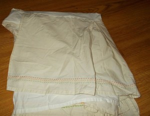 beige crib skirt