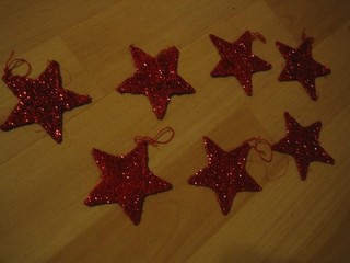 Sterne 7 rot glitzernd zum Aufhängen neuwertig Durchmesser ca.10 cm Weihnachten