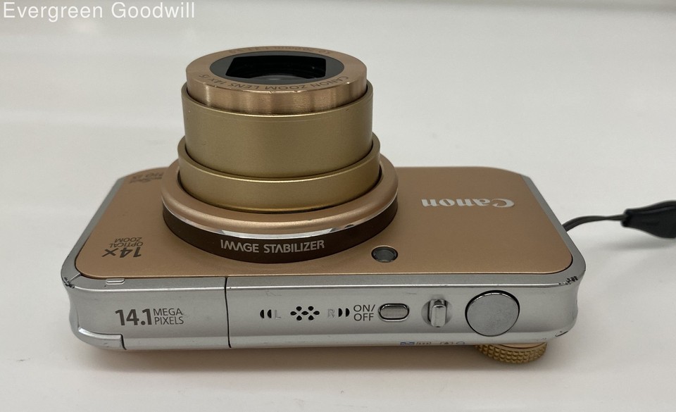 A Canon Powershot SX210 IS digital camera, in box