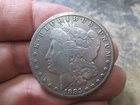 US 1883 CC MORGAN DOLLAR COIN IN FINE CONDITION CLEANED