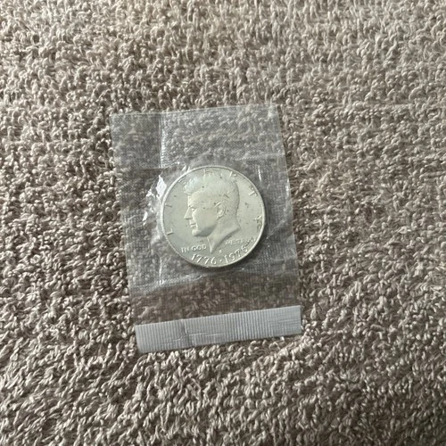 1776 - 1976 S UNCIRCULATED 40% SILVER KENNEDY HALF DOLLAR IN MINT CELLOPHANE