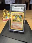 The Pokémon Company CGC 9.5 Charizard 003/034 Classic Holo Pokémon TCG 2023