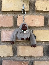 Mono Kipling original "Philip" Gris + Collar Personalizado