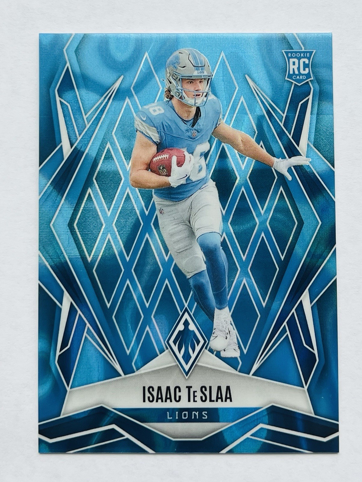 2025 Phoenix Isaac Teslaa Rookie #189 Light Blue Lava /325 RC Detroit Lions