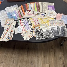 Lot of Assorted Scrapbook Paper And Stickers. Opened And Partial Used Packs.