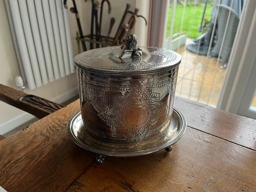 antique tea caddy silver plate .lion with shield on the lid