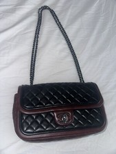 Authenticated Black Quilted Chanel Bag