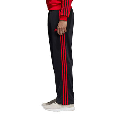 red and black adidas pants