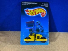 H10-92 HOT WHEELS - ROAD ROLLER / ROULEAU COMPRESSEUR - UNPUNCHED -1988 - YELLOW