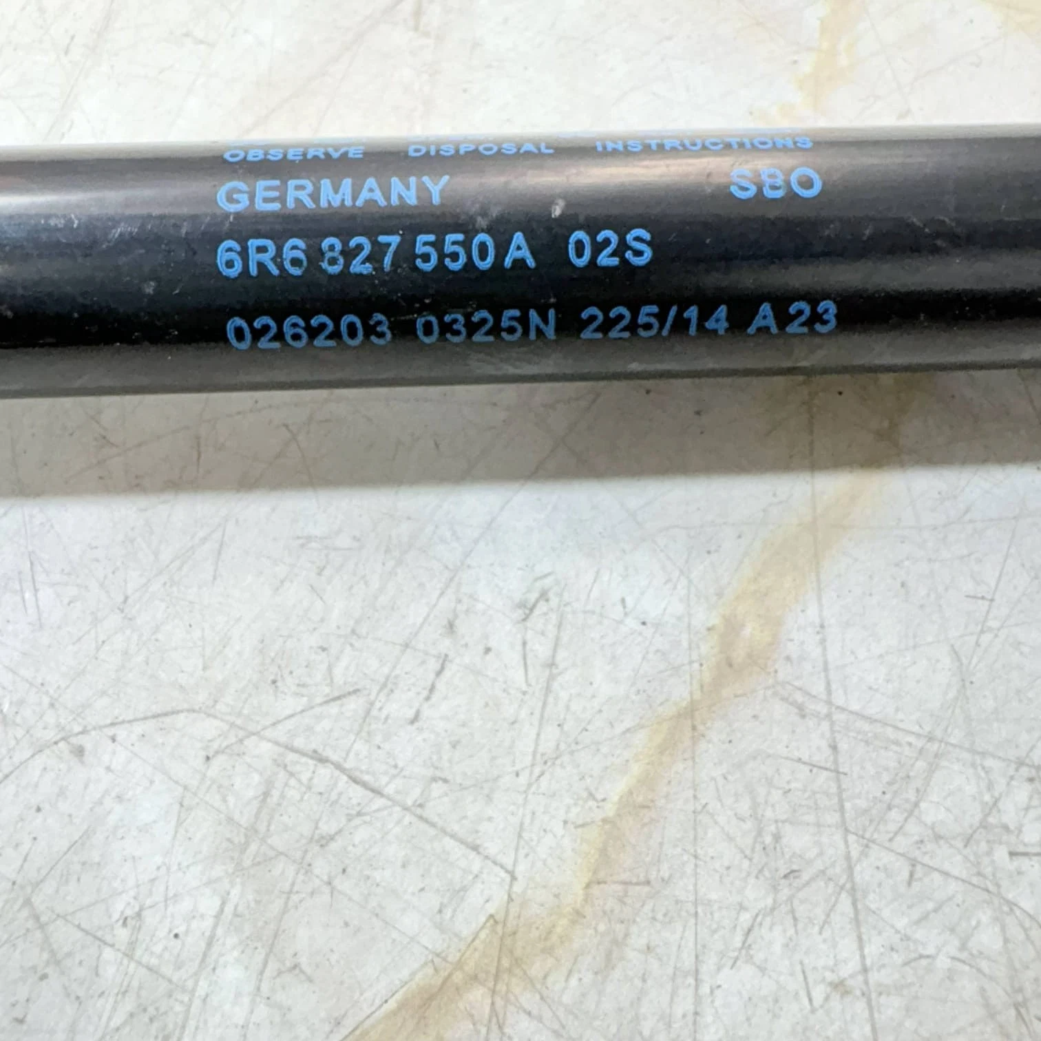 6R6 827 550 A 02S 026203 325N stamped part number close up