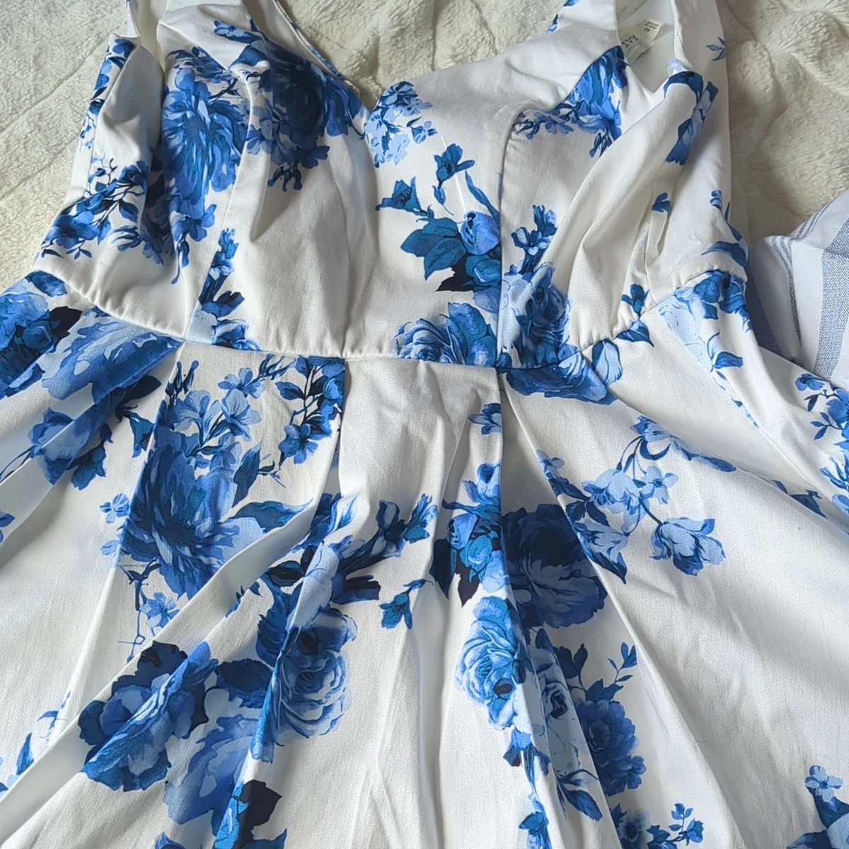 ivy and blue dresses Dress Whisper The Mini Sophia Dress features a charming blue floral print on a crisp white base Hope and Ivy Hope &