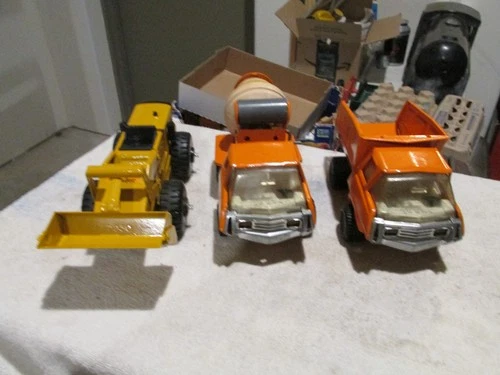 1970'S TONKA DUMP TRUCK , CEMENT TRUCK AND LOADER