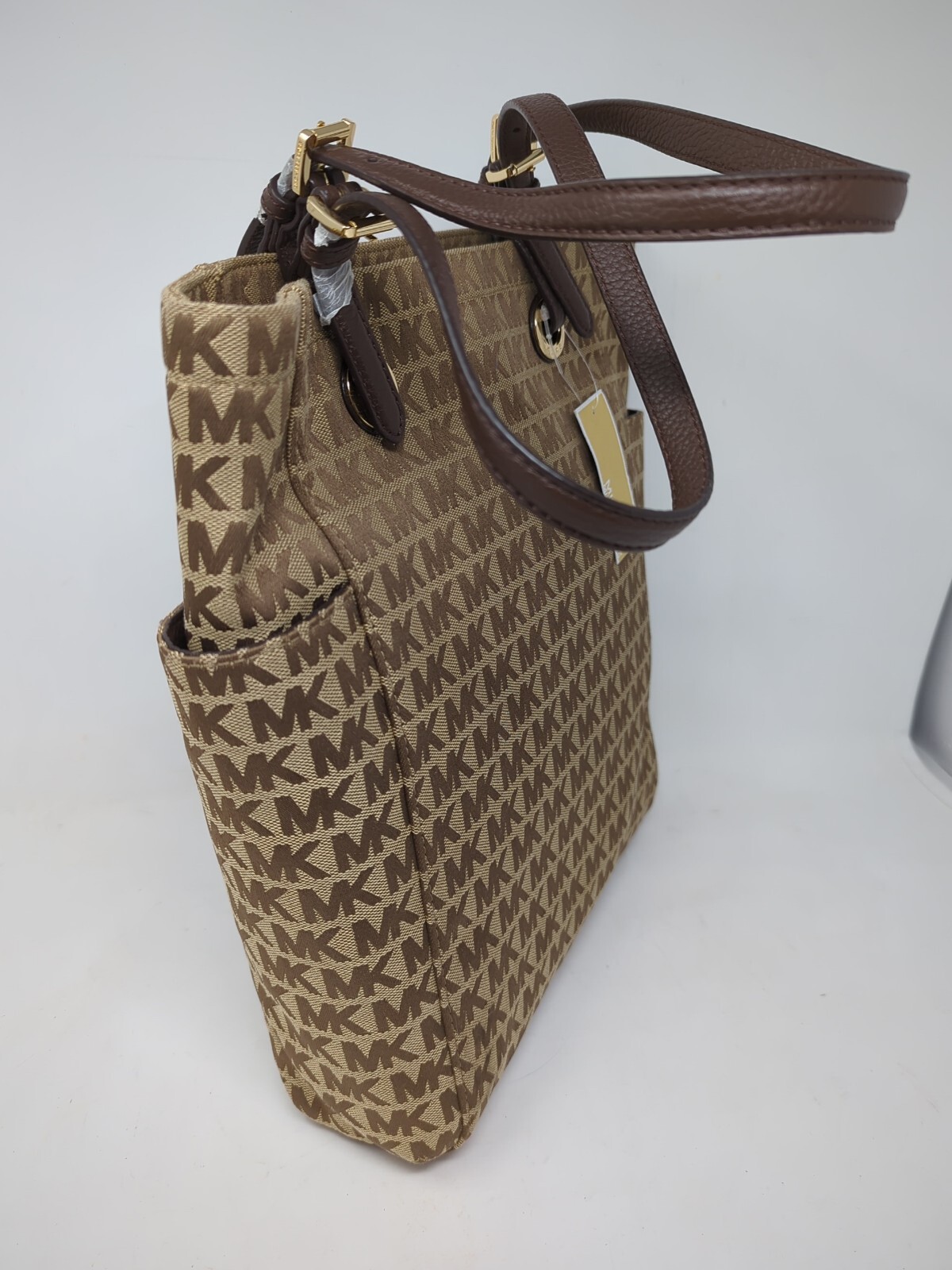 Authentic Michael Kors Brown Jet Set Item Medium NS Tote Signature 
