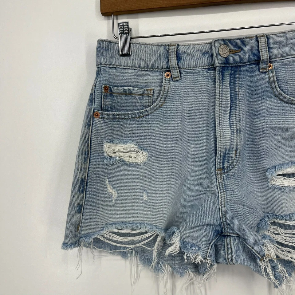 Pantalones cortos de mezclilla Garage para mujer talla 26 azul corte festival desgastado lavado claro Foto 2 de 4