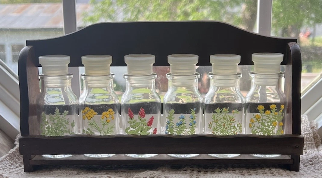 Vintage Mid-Century Wooden Spice Rack Featuring A Row of 6 Floral Glass Bottles
Opens in a new windo