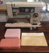 Dressmaker Deluxe Sewing Machine  Zig Zag SWA-2000 with Accessories and Manual