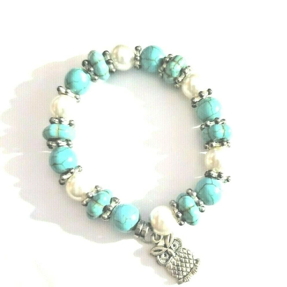 Pulsera de metal con tema de búho elástico con piedras de mármol azul/verde, blanco y metal Foto 2 de 4