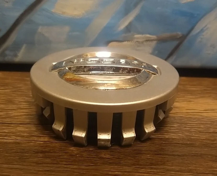 Nissan Armada Frontier 2014 tapa central 40342-EA210 OEM 2,75" plateado Foto 4 de 4