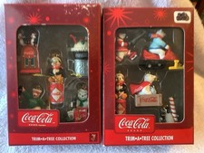 2 Sets Of Coca Cola Trim A Tree Collection w/5 Per Set. NEW IN Box 2000’s
