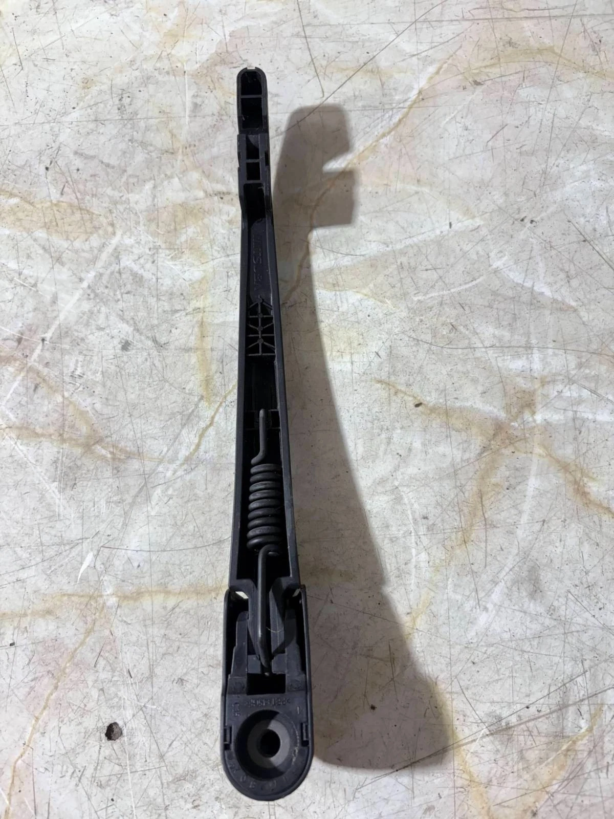 Underside and mounting detail of actual rear wiper arm