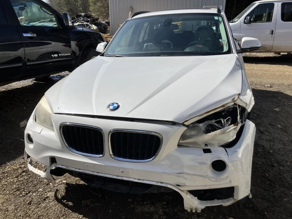 13 eje trasero izquierdo BMW X1 nudillo/tubo Foto 2 de 4