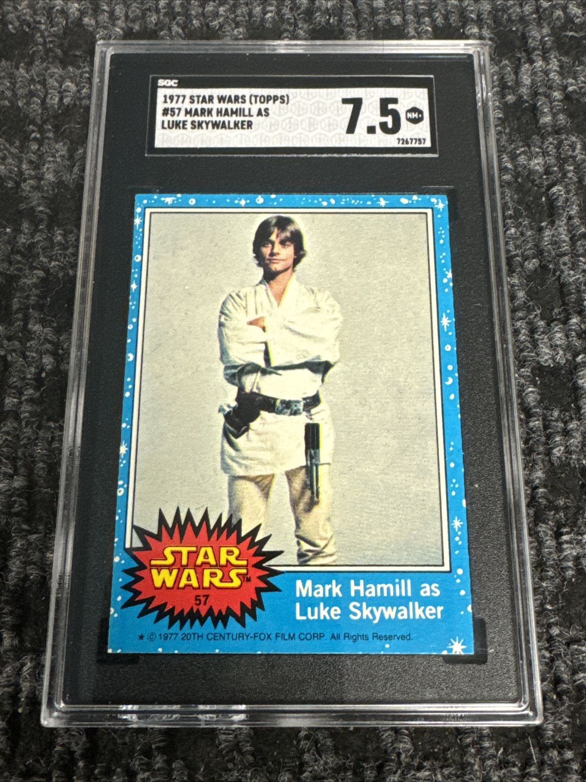 1977 Topps Star Wars #57 Mark Hamill as Luke Skywalker SGC 7.5 NM+